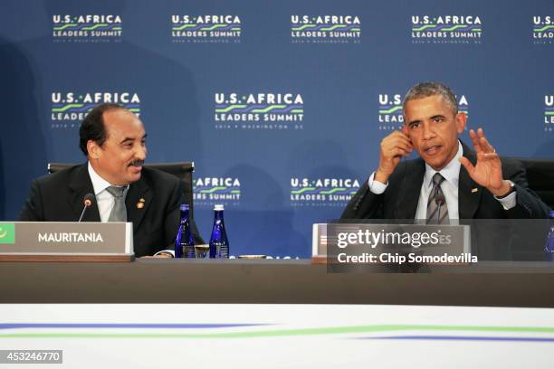 Mauritania President Mohamed Ould Abdel Aziz and U.S. President Barack Obama deliver opening remarks during the first pleanery meeting of the...