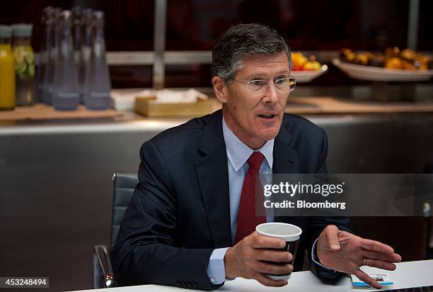 John Thain, chief executive officer of CIT Group Inc., speaks during an interview in New York, U.S., on Wednesday, Aug. 6, 2014. CIT Group Inc., the...