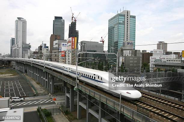 Series Shinkansen bullet train departs at Nagoya station on July 1, 2007 in Nagoya, Aichi, Japan.