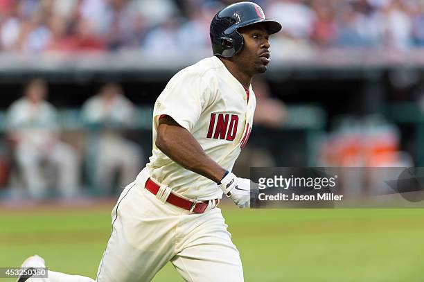 Michael Bourn of the Cleveland Indians rounds the bases after hitting a solo home run during the third inning against the Kansas City Royals at...