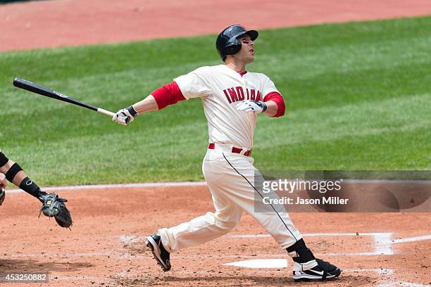 George Kottaras of the Cleveland Indians hits a solo home run during the third inning against the Chicago White Sox at Progressive Field on May 4,...