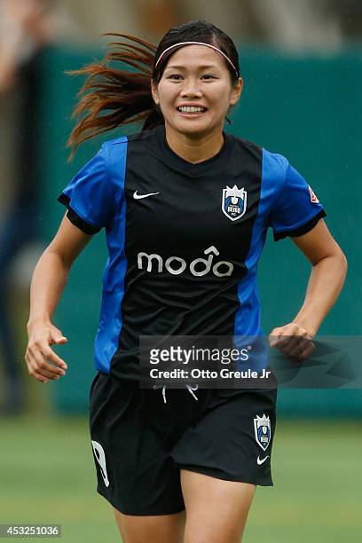 Nahomi Kawasumi of the Seattle Reign FC follows the play against the Chicago Red Stars at Moda Pitch at Memorial Stadium on July 20, 2014 in Seattle,...