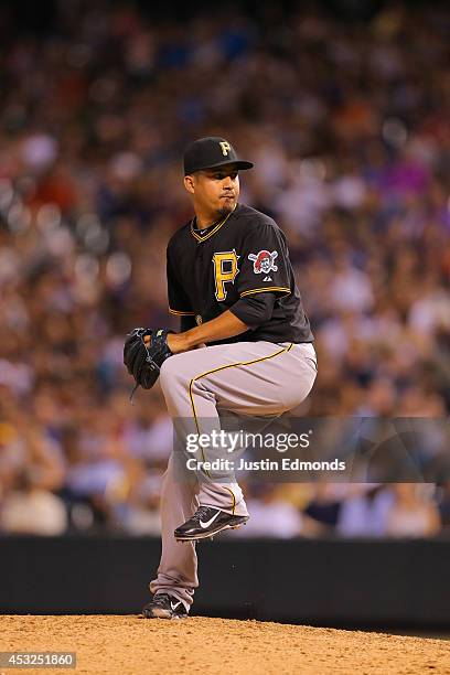 Ernesto Frieri of the Pittsburgh Pirates pitches against the Colorado Rockies at Coors Field on July 25, 2014 in Denver, Colorado.