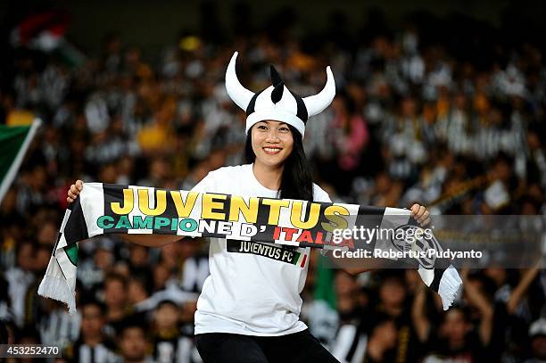 Juventus FC supporter shows their support during the pre season friendly match between Indonesia Selection All Star Team and Juventus FC at Gelora...