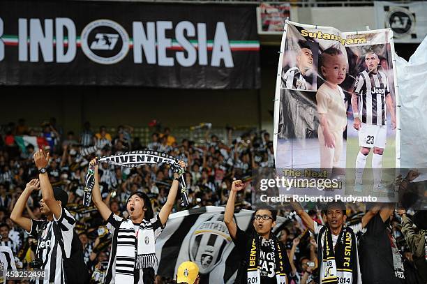 Juventus FC supporters show their support during the pre season friendly match between Indonesia Selection All Star Team and Juventus FC at Gelora...