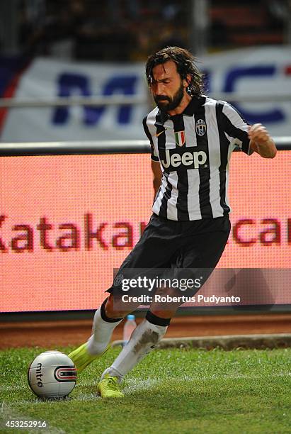 Andrea Pirlo of Juventus FC kicks the ball during the pre-season friendly match between Indonesia Selection All Star Team and Juventus FC at Gelora...