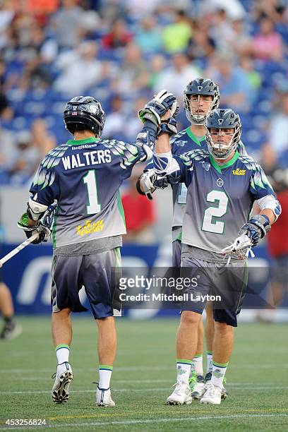 Joe Walters and Brendan Mundorf of the Chesapeake Bayhawks celbrate agoal during a Major League Lacrosse game against the Denver Outlaws on July 31,...