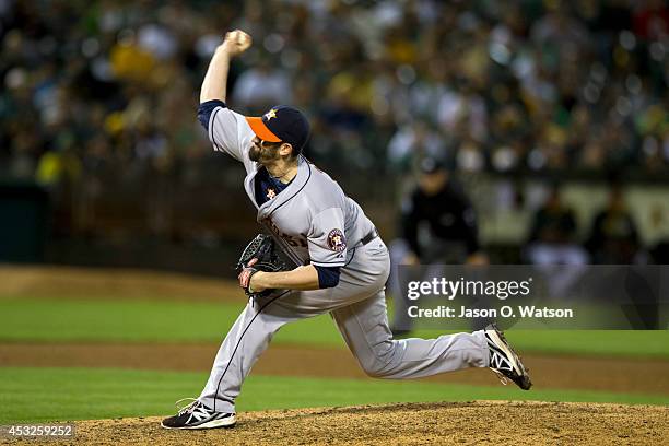 Josh Zeid of the Houston Astros pitches against the Oakland Athletics during the eighth inning at O.co Coliseum on July 23, 2014 in Oakland,...