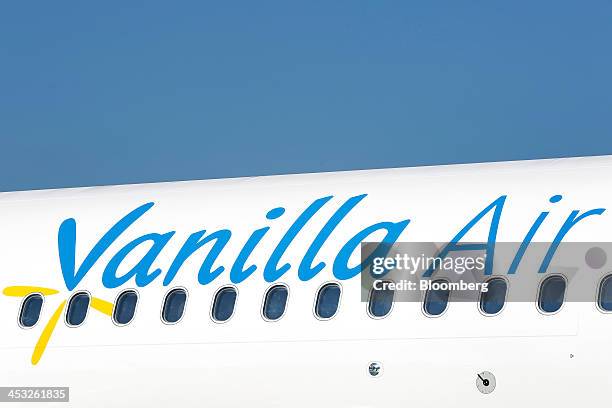 The Vanilla Air logo sits on the fuselage of the company's first Airbus SAS A320 aircraft during a media preview at Narita Airport in Narita, Chiba...