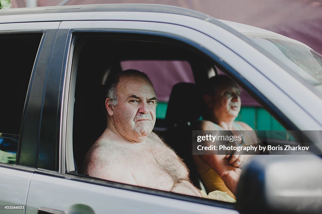 Two men sitting in the car