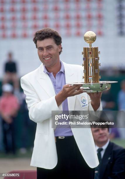 Mike Harwood of Australia with the trophy after winning the European Open Golf Tournament held at the Walton Heath Golf Club, Surrey, 1st September...