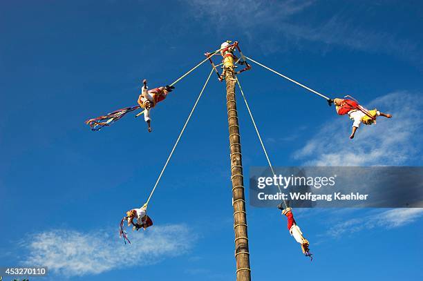 Mexico, Near Cancun, Xcaret Eco Theme Park, Papantla Flying Men Performance .