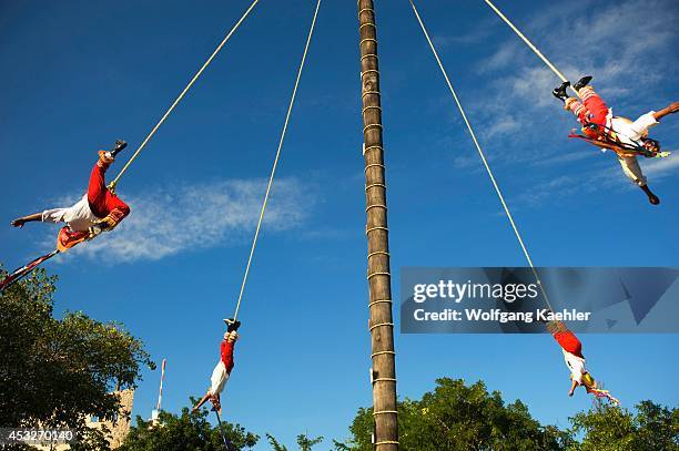 Mexico, Near Cancun, Xcaret Eco Theme Park, Papantla Flying Men Performance .