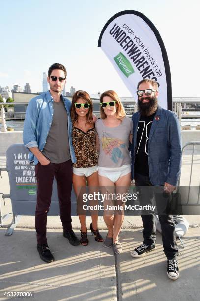Ryan Merchant and Sebu Simonian of Capital Cities pose at the Drop Your Pants and Dance for Underwareness Concert, hosted by Depend on August 6, 2014...