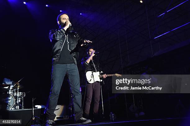 Sebu Simonian and Ryan Merchant of Capital Cities perform onstage at the Drop Your Pants and Dance for Underwareness Concert, hosted by Depend on...