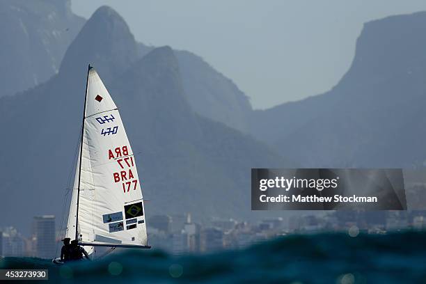 Fernanda Oliveira and Ana Barbachan of Brazil sail on the Copacobana course during the Women's 470 Class as part of the Aquece Rio International...