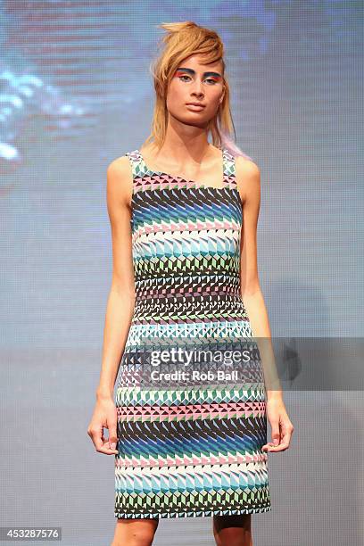 Model on the catwalk for Finish designer 2OR+BYYAT at Copenhagen Fashion Week on August 6, 2014 in Copenhagen, Denmark.