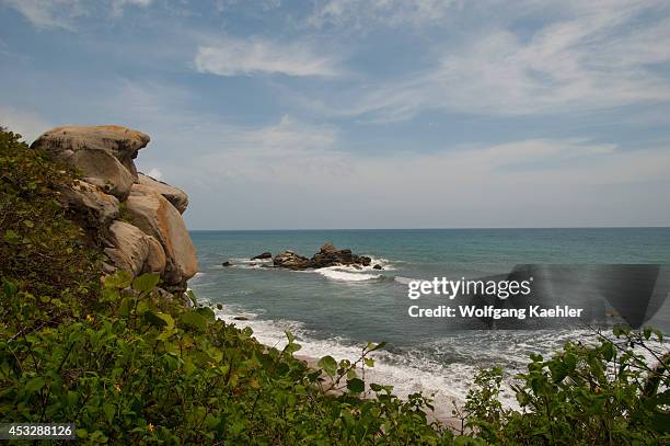 Granite rock formation along coastline at Tayrona National Park, Santa Marta, Colombia.