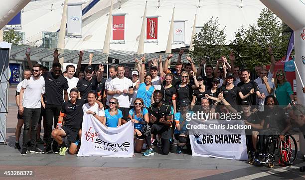 Strive Challenge competitors pose as they prepare to start the Virgin STRIVE challenge at 02 Arena on August 7, 2014 in London, England.