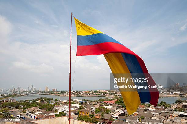 Unesco World Heritage Site San Felipe Castle with giant Colombian flag in Cartagena, Colombia.