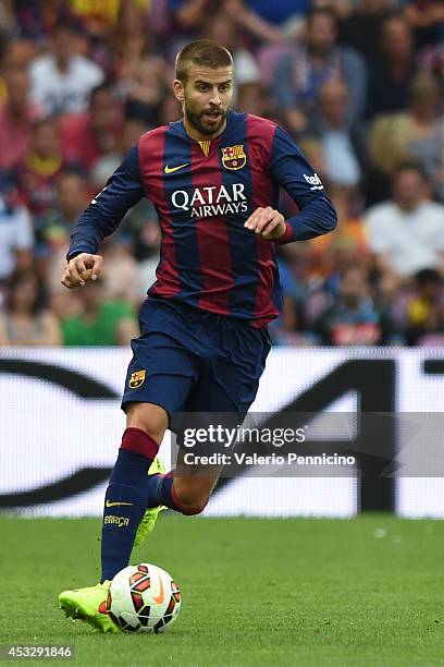 Gerard Pique of FC Barcelona in action during the pre-season friendly match between FC Barcelona and SSC Napoli on August 6, 2014 in Geneva,...