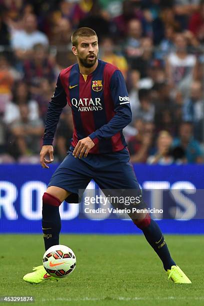 Gerard Pique of FC Barcelona in action during the pre-season friendly match between FC Barcelona and SSC Napoli on August 6, 2014 in Geneva,...