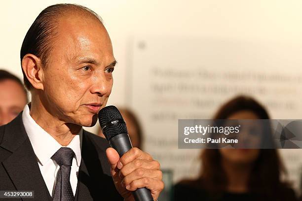 Jimmy Choo addresses guests before officially opening The Story of Professor Jimmy Choo OBE at Claremont Quarter on August 7, 2014 in Perth,...