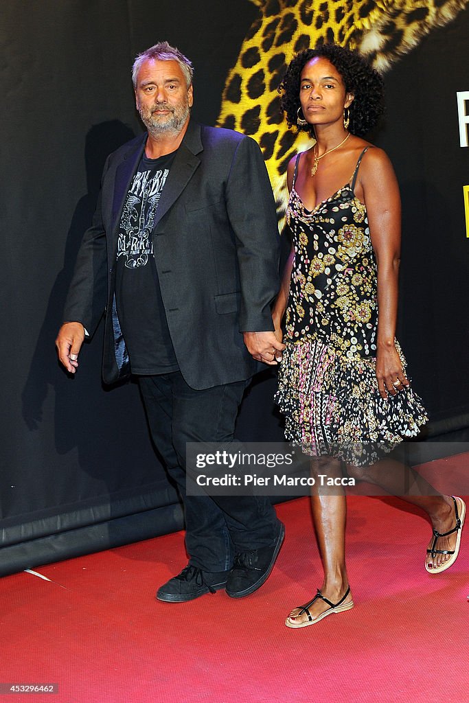 Luc Besson Spouse Luc Besson and his wife Virginie Silla attend 'Lucy' Premiere on ...