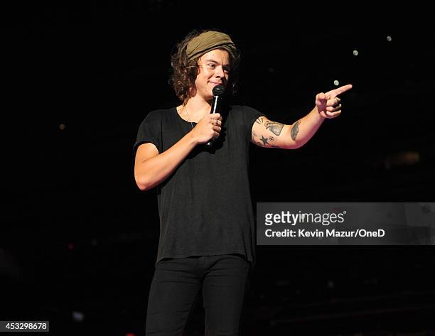 Harry Styles performs onstage during the "Where We Are" tour at Met Life Stadium on August 4, 2014 in New York City.