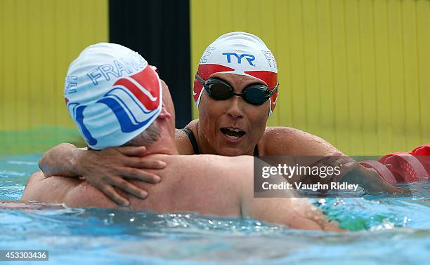 Team Etoile Sant Leu Ple 1 of France compete in the Mixed 4x50m Medley Relay at Parc Jean-Drapeau during the 15th FINA World Masters Championships on...