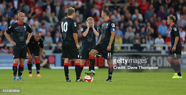 Paul Scholes, centre, stands dejected after the Class of 92 XI went 0-2 down during the match between Salford City and the Class of '92 XI at AJ Bell...