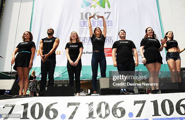 The cast members from '50 Shades!' The Musical perform during 106.7 LITE FM's Broadway in Bryant Park 2014 at Bryant Park on August 7, 2014 in New...