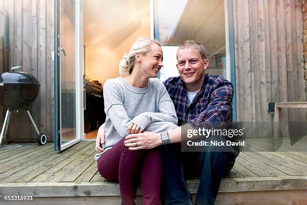 family lifestyle - couple sitting stock pictures, royalty-free photos & images