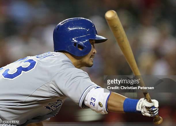 Norichika Aoki of the Kansas City Royals hits a single against the Arizona Diamondbacks during the third inning of the MLB game at Chase Field on...