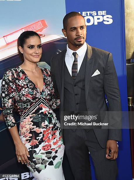Actor Damon Wayns Jr. And Samara Saraiva arrive at the premiere of Twentieth Century Fox's "Let's Be Cops" at ArcLight Hollywood on August 7, 2014 in...