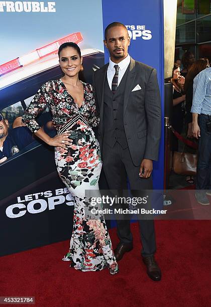 Actor Damon Wayns Jr. And Samara Saraiva arrive at the premiere of Twentieth Century Fox's "Let's Be Cops" at ArcLight Hollywood on August 7, 2014 in...