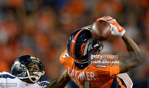 Denver Broncos wide receiver Cody Latimer can't hold on to a pass as Seattle Seahawks cornerback A.J. Jefferson defends on the play during the third...