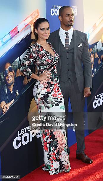 Actor Damon Wayans Jr. And Samara Saraiva attend the premiere of Twentieth Century Fox's "Let's Be Cops" at ArcLight Hollywood on August 7, 2014 in...
