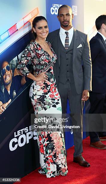 Actor Damon Wayans Jr. And Samara Saraiva attend the premiere of Twentieth Century Fox's "Let's Be Cops" at ArcLight Hollywood on August 7, 2014 in...