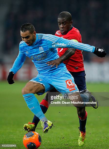 Rio Mavuba of Lille and Dimitri Payet of Marseille battle for the ball during the Ligue 1 match between LOSC Lille and Olympique de Marseille held at...