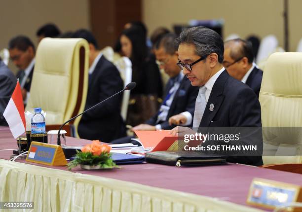 Indonesia Foreign Minister Marty Natalegawa attends a meeting of the Southeast Asian Nuclear-Weapon-Free-Zone commission during the 47th ASEAN...