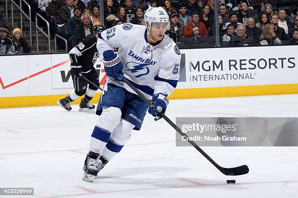 Valtteri Filppula of the Tampa Bay Lightning skates with the puck against the Los Angeles Kings at Staples Center on November 19, 2013 in Los...