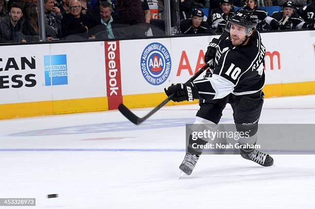 Mike Richards of the Los Angeles Kings shoots the puck against the Tampa Bay Lightning at Staples Center on November 19, 2013 in Los Angeles,...