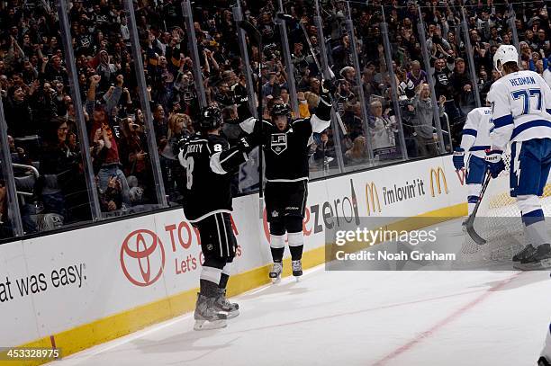 Anze Kopitar and Drew Doughty of the Los Angeles Kings celebrate after a goal against the Tampa Bay Lightning at Staples Center on November 19, 2013...