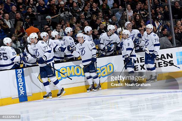 The Tampa Bay Lightning celebrate with the bench after a goal against the Los Angeles Kings at Staples Center on November 19, 2013 in Los Angeles,...