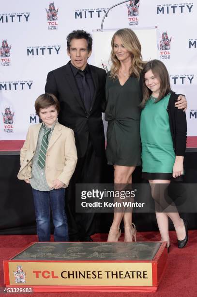 Actor Ben Stiller poses with his wife, actress Christine Taylor, and their children Quinlin Stiller and Ella Stiller as he is honored with a hand and...