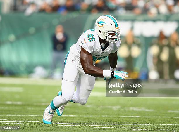 Dion Jordan of the Miami Dolphins in action against the New York Jets during their game at MetLife Stadium on December 1, 2013 in East Rutherford,...