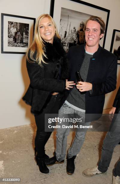 Chelsy Davy and Michael Walker attend a private view of Nikolai Von Bismarck's new photography exhibition 'In Ethiopia' at 12 Francis Street Gallery...