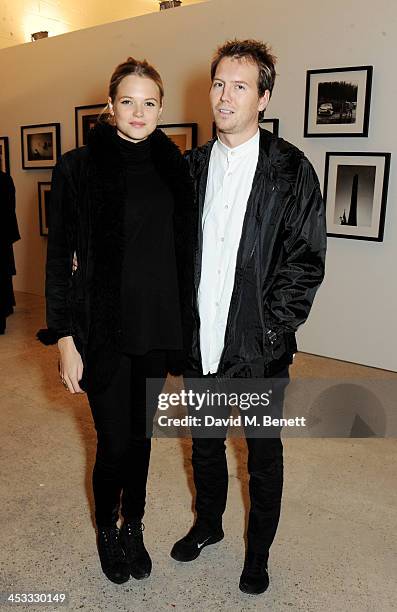 Gabriella Wilde and Alan Pownall attend a private view of Nikolai Von Bismarck's new photography exhibition 'In Ethiopia' at 12 Francis Street...