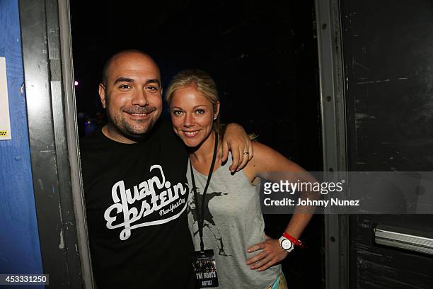 Radio personality Peter Rosenberg and wife Alexa Rosenberg attend the grand opening of the Guitar Center Times Square Flagship Store on August 7,...
